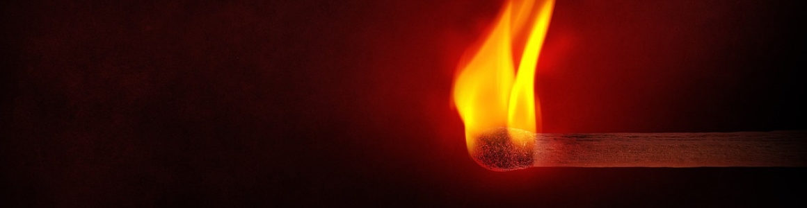 upclose of flames off a match.