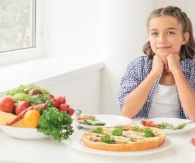 A young girl with healthy food representing child nutrition.
